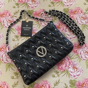 Valentino studded leather luxurious black handbag with silver hardware.